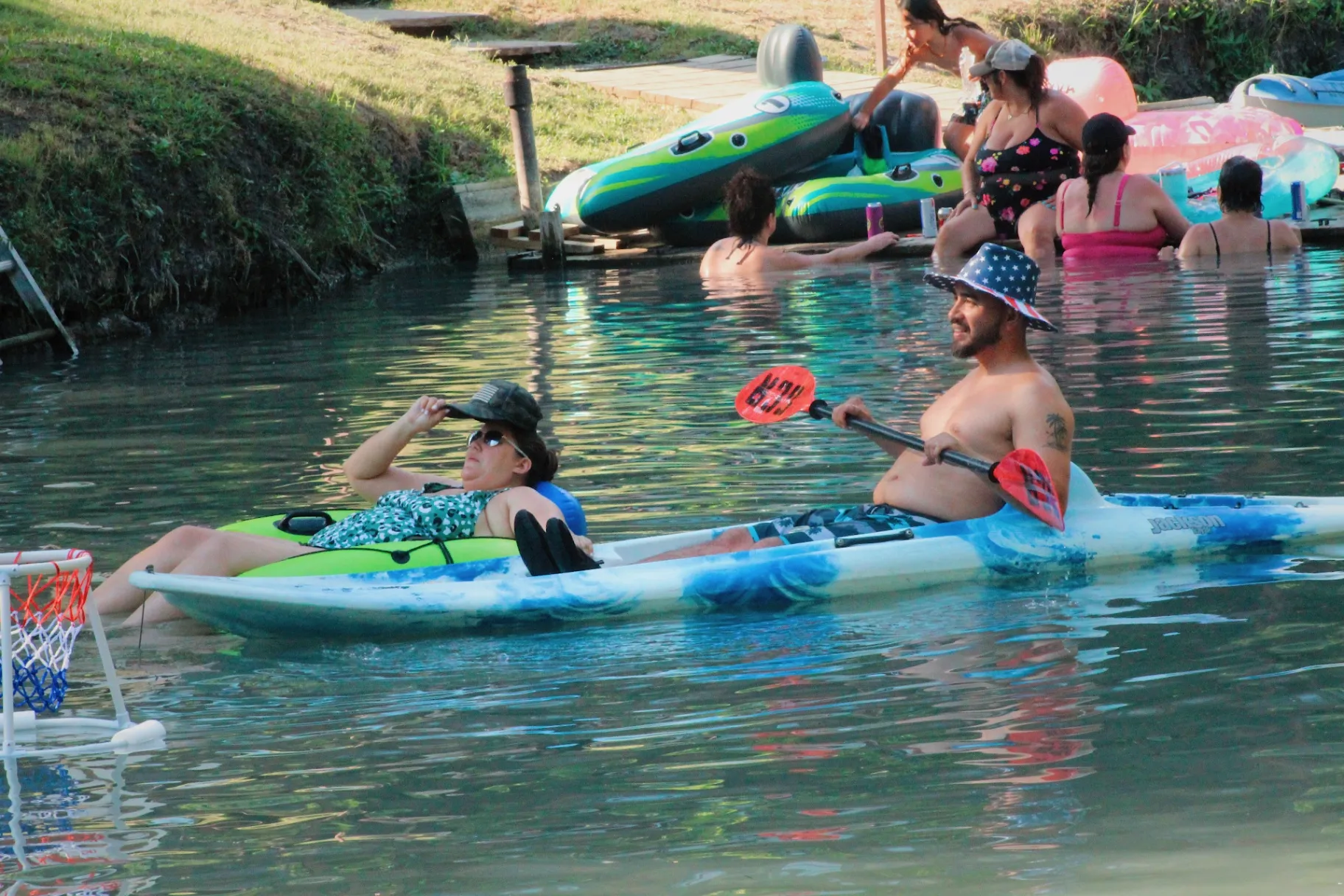 Couple kayaking on the creek