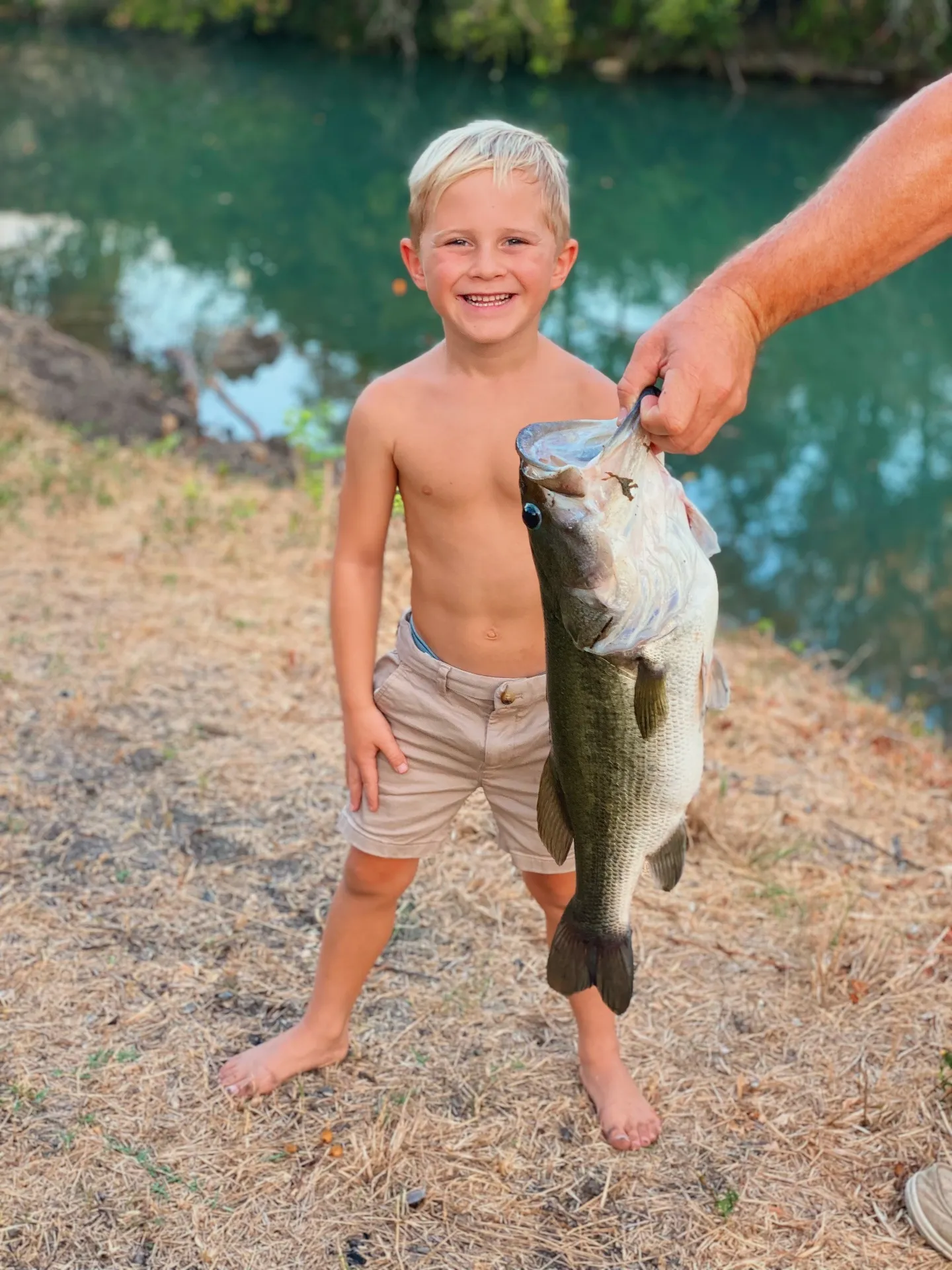 Young guest with a small fish from Geronimo Creek