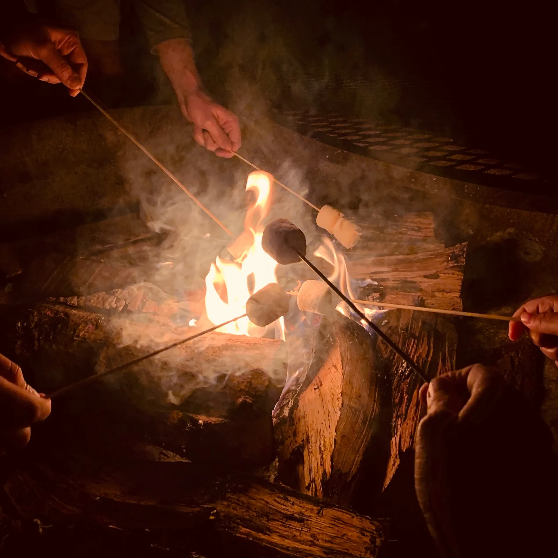 Friday night campfire at Son's Geronimo glamping cabins near San Antonio